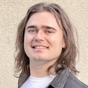 Headshot of Ryan Corp